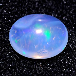 Unheated 0.63 Ct. Oval Cab Natural Multi Color Opal Gem