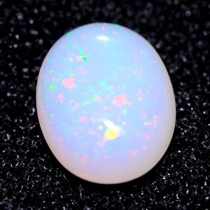 Unheated 0.63 Ct. Oval Cab Natural Multi Color Opal Gem