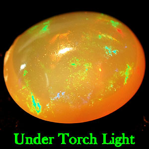 0.61 Ct. Oval Cab Natural Multi Color Opal Sudan Gem