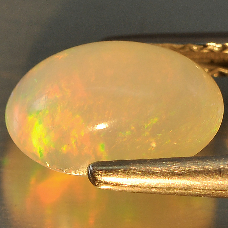 1.08 Ct. Oval Cab Natural Gem Multi Color Opal Unheated