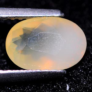 0.99 Ct. Oval Natural White Color Opal Sudan Unheated