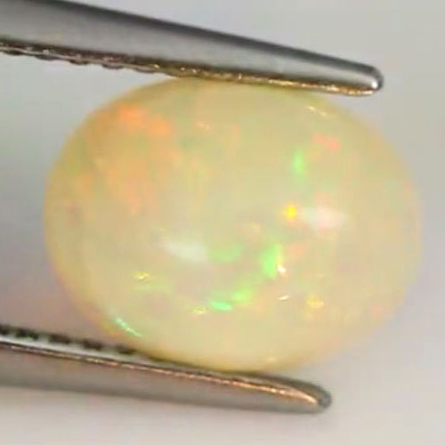Opal Multi Color 1.79 Ct. Oval Cabochon 9.7 x 7.5 Mm. Natural Gem Unheated Sudan