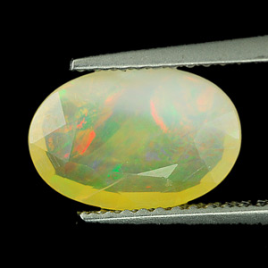 1.56 Ct. Oval Natural Multi Color Opal Sudan Unheated