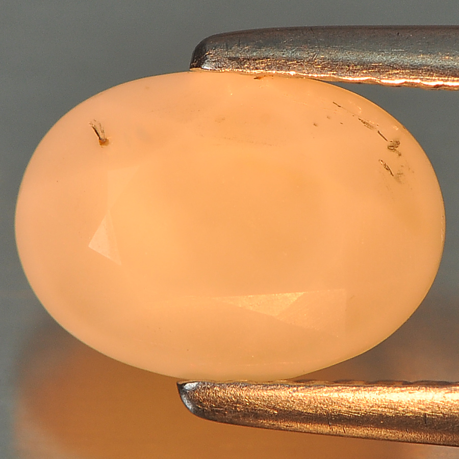 1.24 Ct. Oval Natural White Yellow Opal Sudan Unheated
