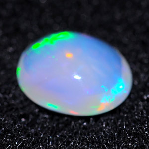 0.66 Ct. Oval Cabochon Natural Multi Color Opal Sudan
