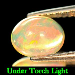 Opal 0.83 Ct. Multi-Color Play Of Colour Natural Oval Cabochon 7.6 x 6.2 Mm.