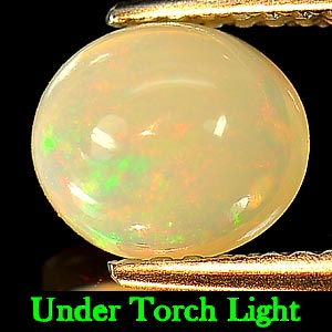 1.05 Ct. Oval Cab Natural Multi - Color Play Of Colour Opal