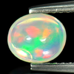 0.69 Ct. Oval Cabochon Natural Multi - Color Play Of Colour Opal