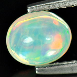 0.41 Ct. Natural Multi - Color Play Of Colour Opal Oval Cab Unheated