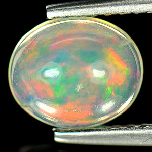 0.79 Ct. Oval Cabochon Natural Multi-Color Play Of Colour Opal Unheated