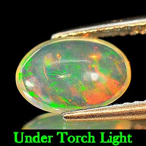 0.98 Ct. Natural Multi - Color Play Of Colour Opal Oval Cabochon Unheated
