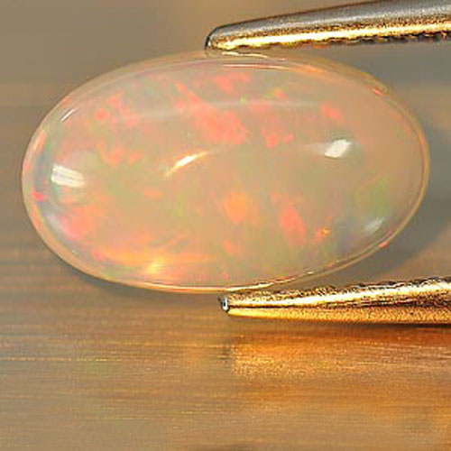Opal Multi-Color 1.64 Ct. Oval Cabochon11.1 x 6.7 Mm. Natural Gemstone Unheated