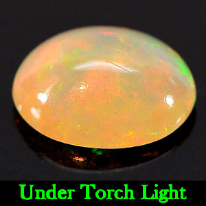 Natural Gemstone 0.76 Ct. Oval Cabochon Multi - Color Play Of Colour Opal