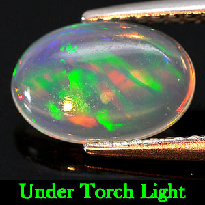 Natural Gemstone 0.74 Ct. Oval Cabochon Multi - Color Play Of Colour Opal