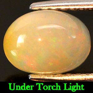 Natural 0.98 Ct. 7.9 x 5.9mm. Oval Cabochon Multi-Color Play Of Colour Opal