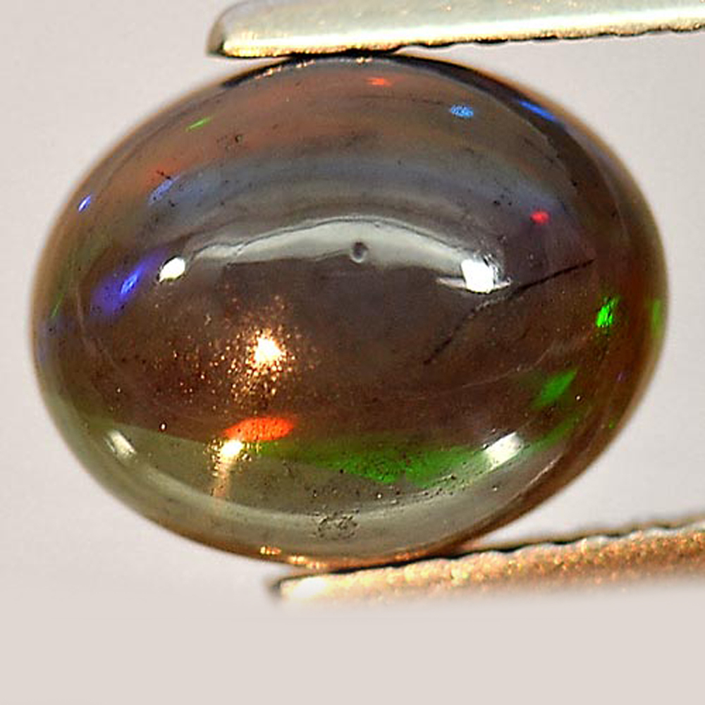 Opal Multi-Color 1.86 Ct. Oval Cabochon Shape 10 x 8.1 Mm. Natural Gemstone