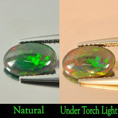 Natural  Play Of Color Rainbow Fire Red Black Opal 0.78 Ct. Oval Cab10 x 6.8 Mm.