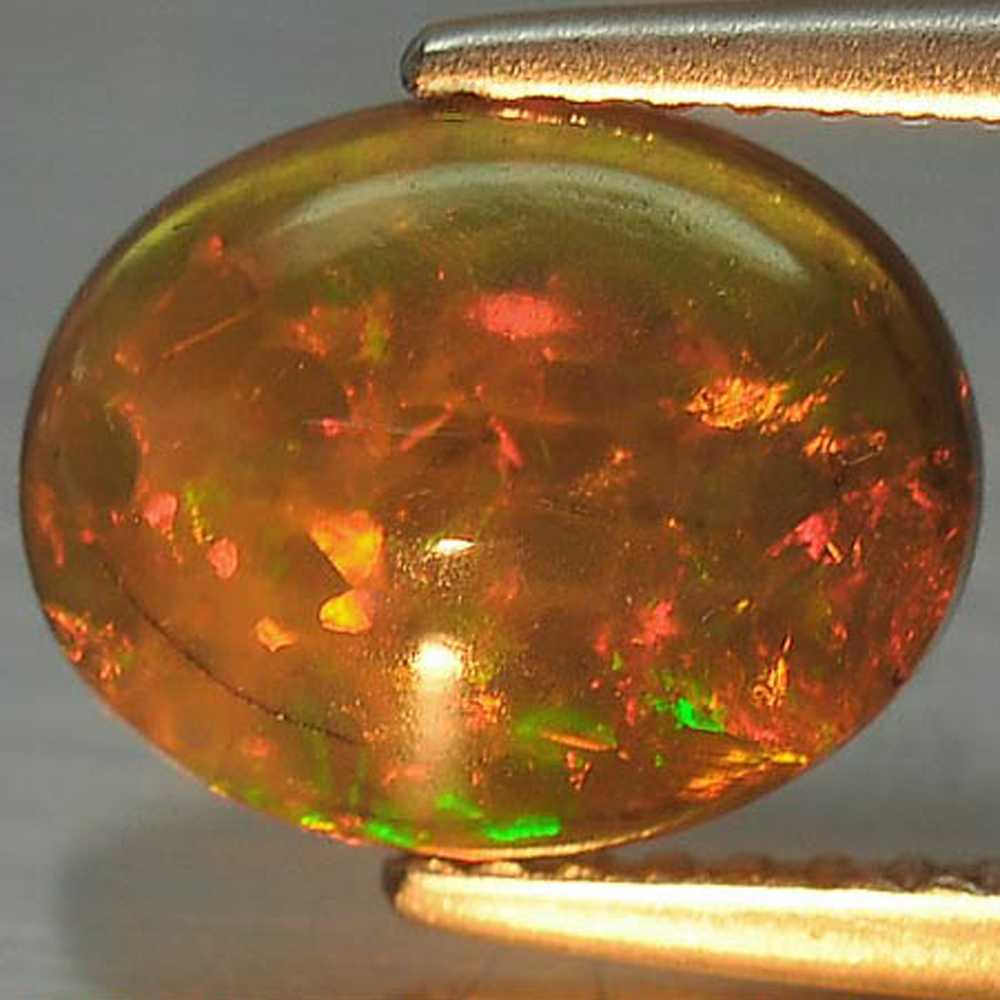Play Of Color Rainbow Fire Red Black Opal 1.49 Ct. Oval Cabochon Natural Gem