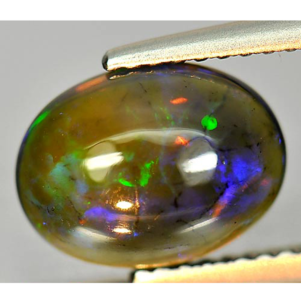 Play Of Color Rainbow Fire Red Black Opal 1.54 Ct Oval Cabochon Natural Gemstone