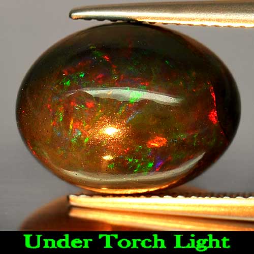 6.59 Ct. Oval Cabochon Natural Gem Play Of Color Rainbow Fire Red Black Opal