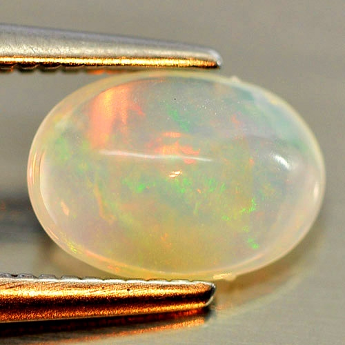 Good Natural Gem 0.69 Ct. Oval Cabochon Play Of Colour Multi Color Opal