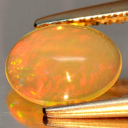 0.67 Ct. Alluring Natural Gem Multi Color Play Of Colour Opal Oval Cabochon