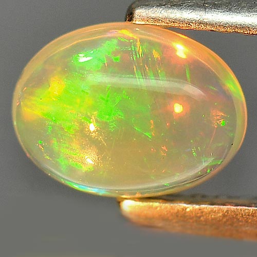 0.92 Ct. Sz 8 x 6 Mm. Oval Cab Natural Gem Multi Color Play Of Colour Opal