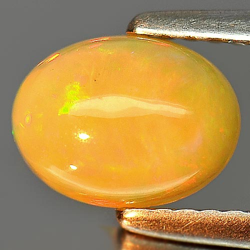 Natural Gem 0.81 Ct. Oval Cabochon Multi Color Play Of Colour Opal Sz 8 x 6 Mm.