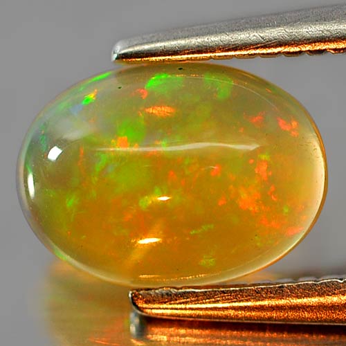 Nice Natural Gem 0.62 Ct. Oval Cabochon Multi Color Play Of Colour Opal