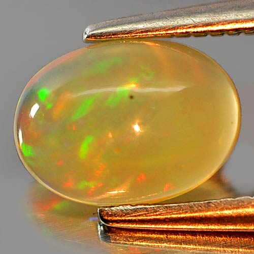 0.69 Ct. Oval Cabochon Natural Gem Multi Color Play Of Colour Opal