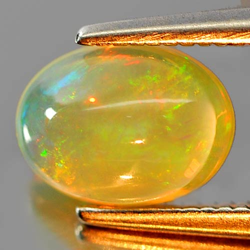 0.81 Ct. Oval Cabochon Natural Gem Multi Color Play Of Colour Opal