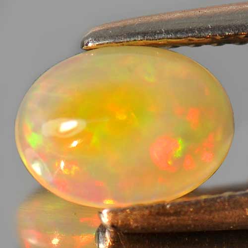 Good Natural Gem 0.69 Ct. Oval Cabochon Multi Color Play Of Colour Opal