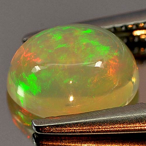 0.72 Ct. Nice Oval Cab Natural Gem Multi Color Play Of Colour Opal