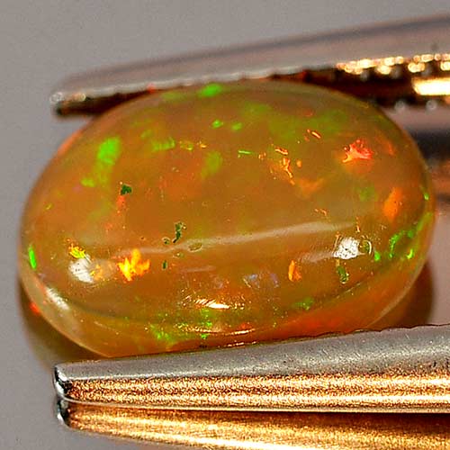 Good Natural Gem 0.63 Ct. Oval Cabochon Multi Color Play Of Colour Opal
