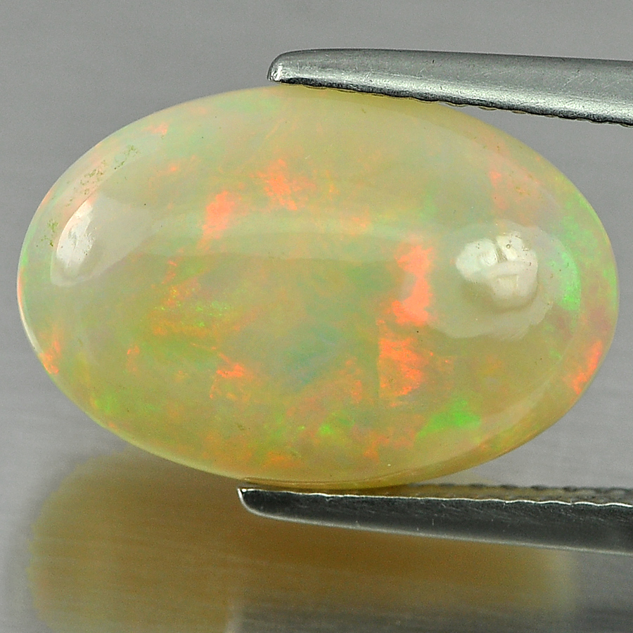 Multi-Color Play Of Colour Opal 6.18 Ct. Oval Cab 16.5 x 11 x 7 Mm. Natural Gem