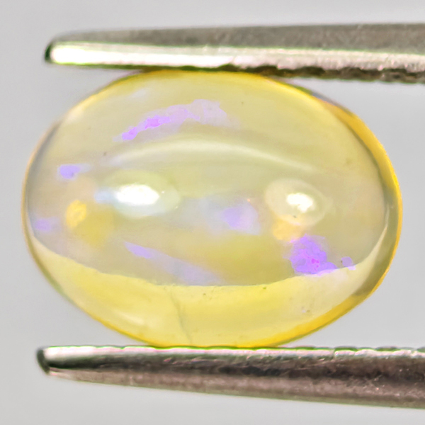 Natural Multi-Color Play Of Colour Opal 0.67 Ct. Oval Cabochon Shape 7.9 x 5.9Mm