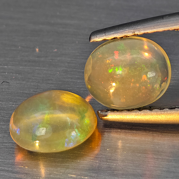 Natural Multi Color Play Of Colour Opal 1.31 Ct. 2 Pcs Oval Cabochon Shape Gemstones From Ethiopia