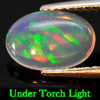 Natural Gemstone 0.74 Ct. Oval Cabochon Multi - Color Play Of Colour Opal Natural Gemstone 0.74 Ct. Oval Cabochon Multi - Color Play Of Colour Opal