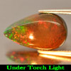 Play Of Color Rainbow Fire Red Black Opal 2.27 Ct. Pear Cabochon Natural Gem Play Of Color Rainbow Fire Red Black Opal 2.27 Ct. Pear Cabochon Natural Gem