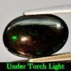 Good Gem 2.28 Ct. Oval Cab Natural Play Of Color Rainbow Fire Red Black Opal