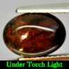Natural Play Of Color Rainbow Fire Red Black Opal Gemstones 1.96 Ct. Oval Cabochon Shape Natural Play Of Color Rainbow Fire Red Black Opal Gemstones 1.96 Ct. Oval Cabochon Shape