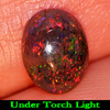 0.98 Ct. Oval Cabochon Natural Play Of Color Rainbow Fire Red Black Opal