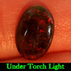 Fire Red Black Opal 0.97 Ct. Oval Cabochon Shape 9.7 x 6.6 Mm. Natural Gemstone Fire Red Black Opal 0.97 Ct. Oval Cabochon Shape 9.7 x 6.6 Mm. Natural Gemstone