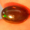 Play Of Color Rainbow Fire Red Black Opal 1.36 Ct. Oval Cab 10.3 x 7 Mm. Natural Play Of Color Rainbow Fire Red Black Opal 1.36 Ct. Oval Cab 10.3 x 7 Mm. Natural