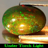 Natural Gem 0.98 Ct. Oval Cabochon Play Of Color Rainbow Fire Red Black Opal