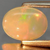 Unheated 0.89 Ct. Oval Cab Natural Gem Multi Color Play Of Colour Opal Unheated 0.89 Ct. Oval Cab Natural Gem Multi Color Play Of Colour Opal
