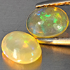 Natural Multi-Color Play Of Colour Opal 0.91 Ct. 2 Pcs Oval Cabochon Shape 7 x 5.6 Mm Gemstones Natural Multi-Color Play Of Colour Opal 0.91 Ct. 2 Pcs Oval Cabochon Shape 7 x 5.6 Mm Gemstones