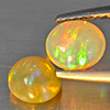 Natural Multi-Color Play Of Colour Opal 1.11 Ct. 2 Pcs Oval Cabochon Shape 6 x 5.4 Mm Gemstones Natural Multi-Color Play Of Colour Opal 1.11 Ct. 2 Pcs Oval Cabochon Shape 6 x 5.4 Mm Gemstones