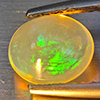 Natural Multi-Color Play Of Colour Opal 0.92 Ct. Oval Cabochon Shape 7.8 x 6.4 Mm Gemstone Ethiopia Natural Multi-Color Play Of Colour Opal 0.92 Ct. Oval Cabochon Shape 7.8 x 6.4 Mm Gemstone Ethiopia