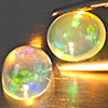 Natural Multi-Color Play Of Colour Opal 1.51 Ct. 2 Pcs Oval Cabochon Shape 6.6 x 5.5 Mm Gemstones Natural Multi-Color Play Of Colour Opal 1.51 Ct. 2 Pcs Oval Cabochon Shape 6.6 x 5.5 Mm Gemstones